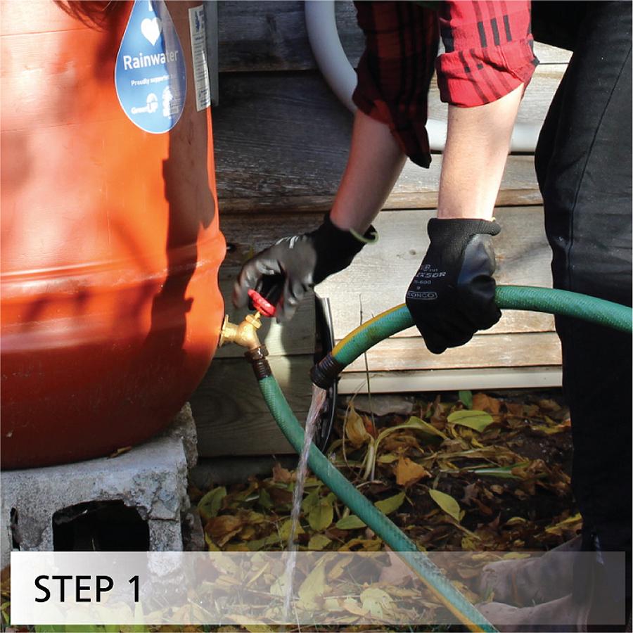 Drain any remaining water from the rain barrel
