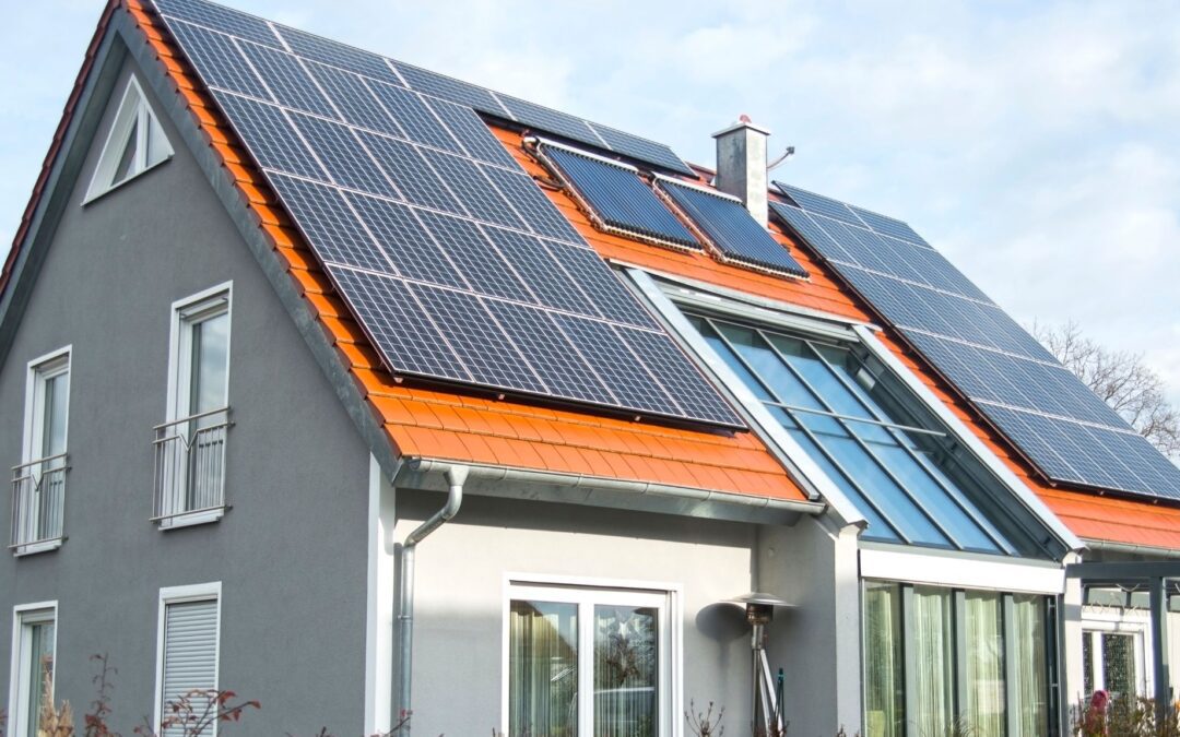 A retrofitted home with solar panels installed on the roof.