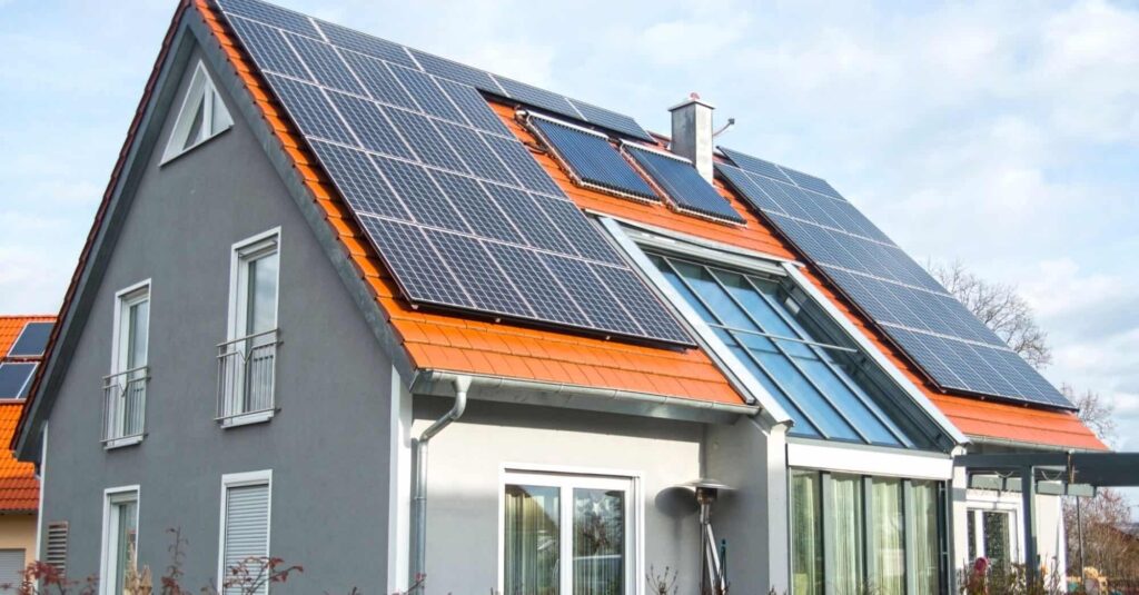 A retrofitted home with solar panels installed on the roof.