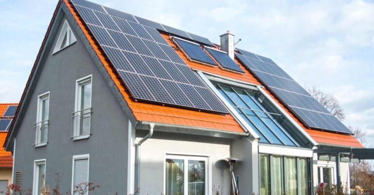 A retrofitted home with solar panels installed on the roof.