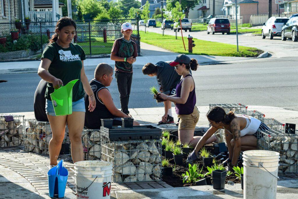 People engaged in planting in Winnipeg