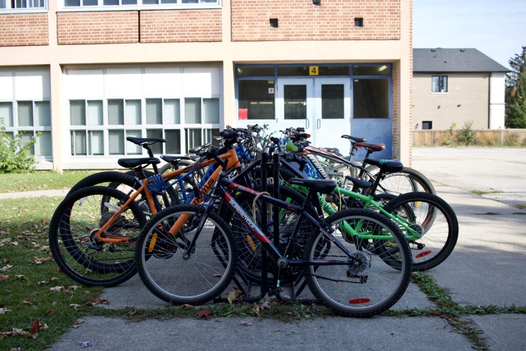 A full bike rack outside one of the schools participating in the Toronto School travel Planning Program  