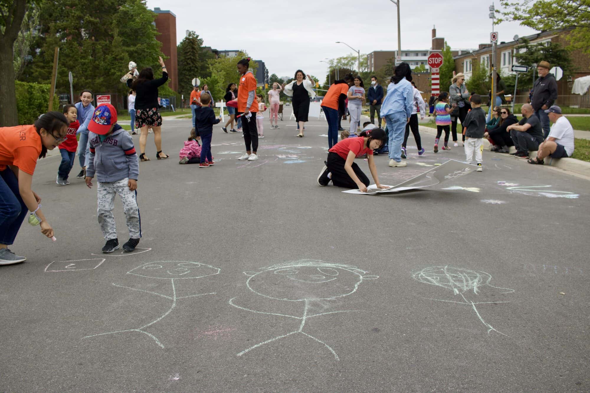 Students, teachers, and community members gathered in the open street at City of Mississauga's 2022 School Streets Pilot