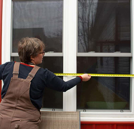 person measuring window